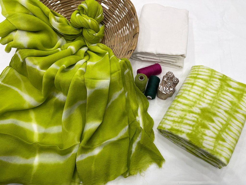 White and green bandhani print cotton suit with chiffon dupatta