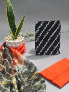 Black and orange bandhani print cotton suit with kota silk dupatta