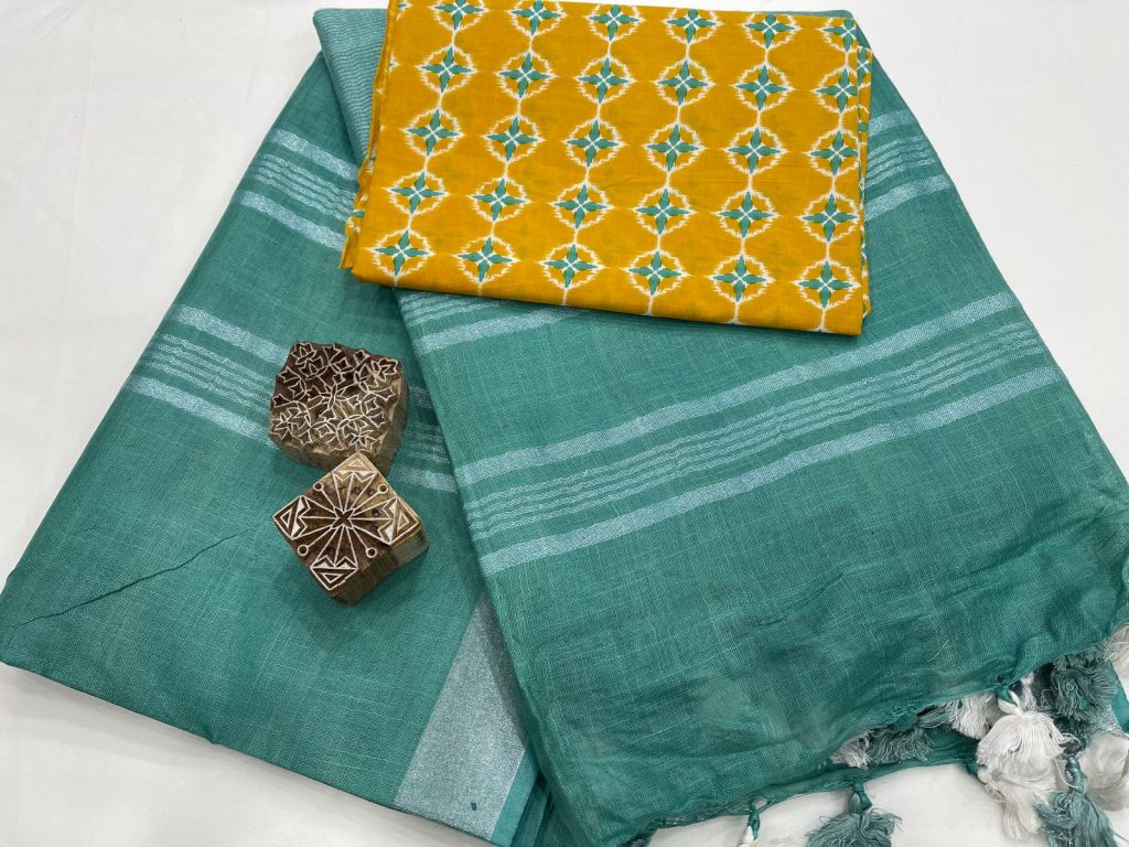 Teal and orange linen Saree with printed blouse