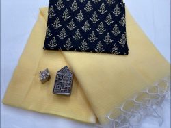 Medium champagne kota doria saree with printed blouse