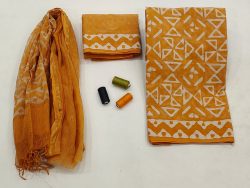 Orange discharge dabu print cotton suit with kota doria dupatta