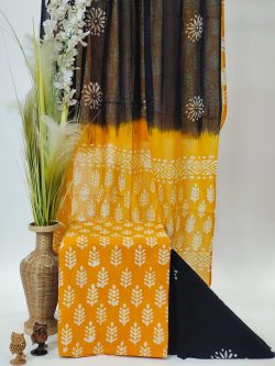 Oragish yellow batik print cotton salwar kameez with dupatta