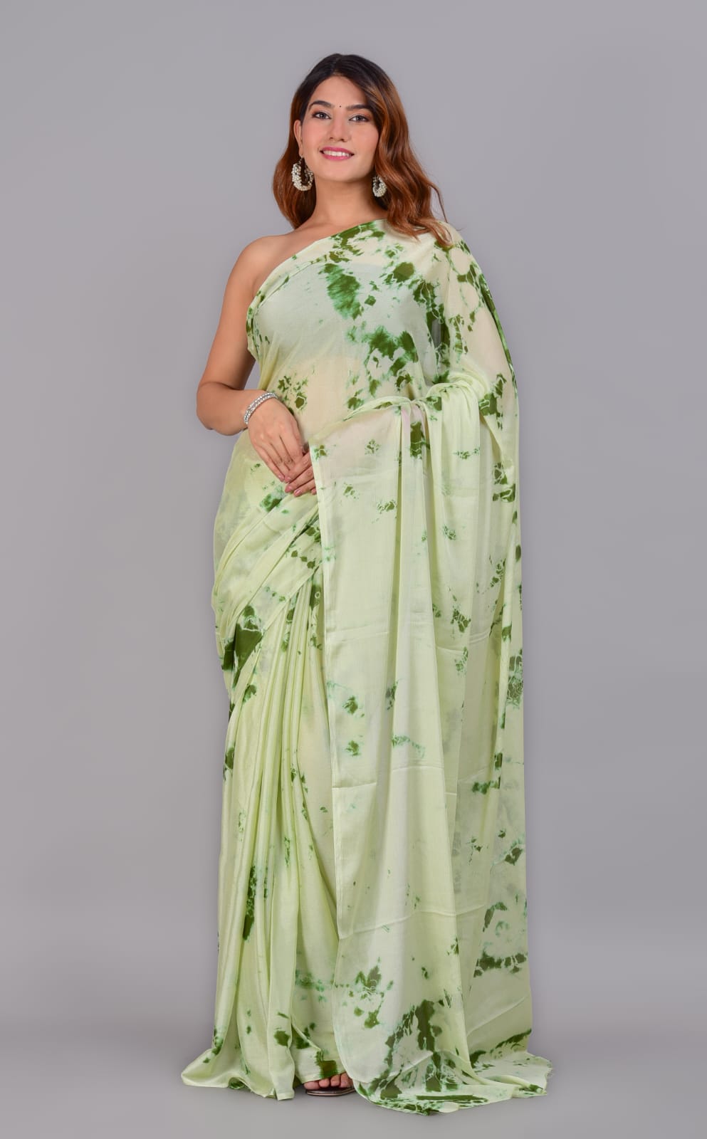 Printed pear green chiffon saree with blouse