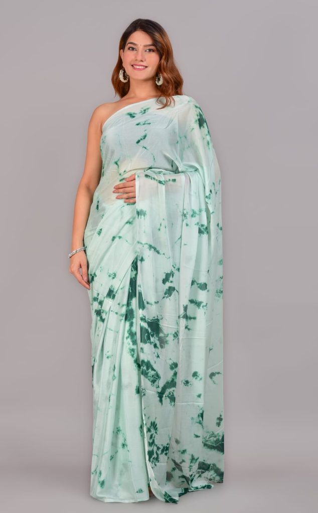 Printed turquoise green chiffon saree with blouse