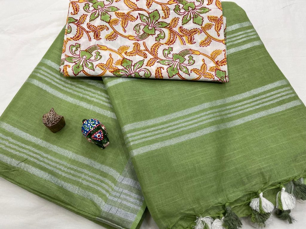 Emerald green plain linen saree with printed blouse