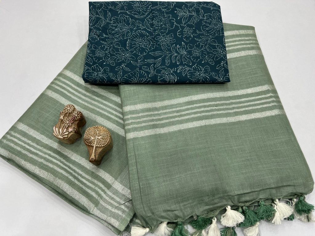Viridian green plain linen silver zari saree