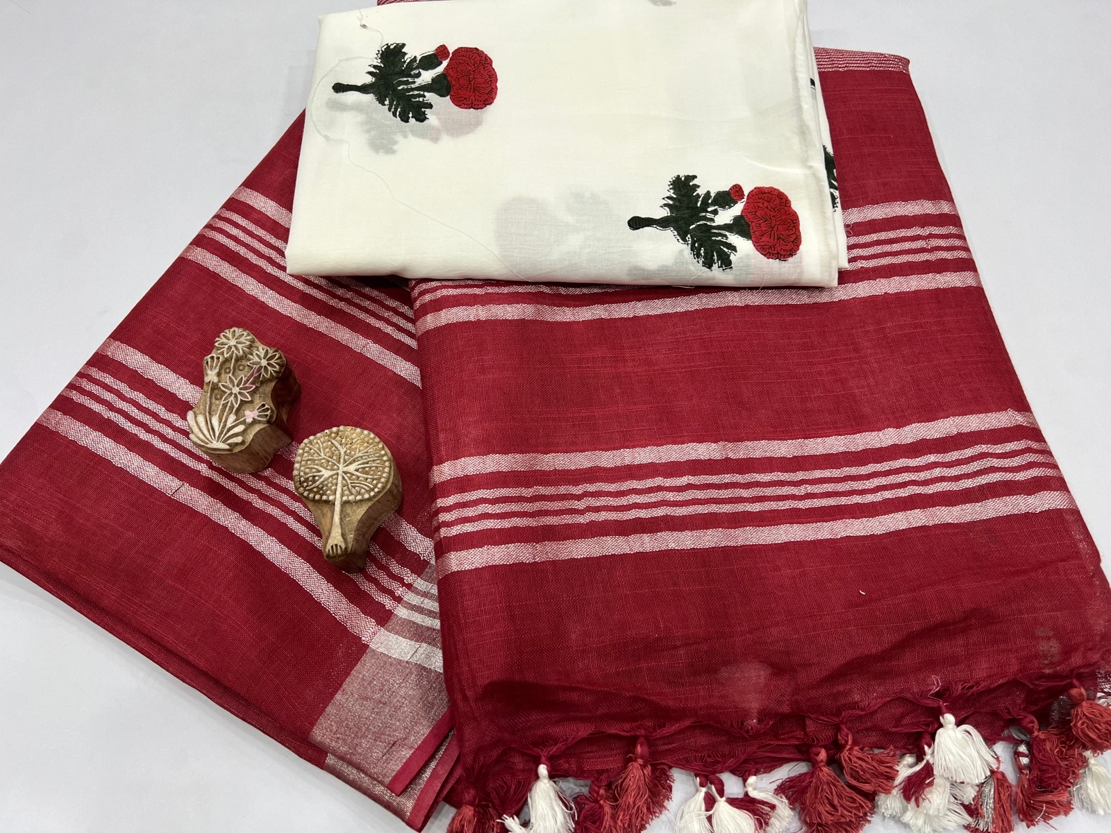 Sangaria red plain linen lace border saree