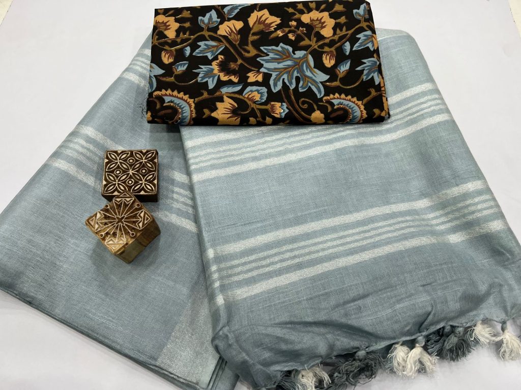 Periwinkle linen saree with silver border