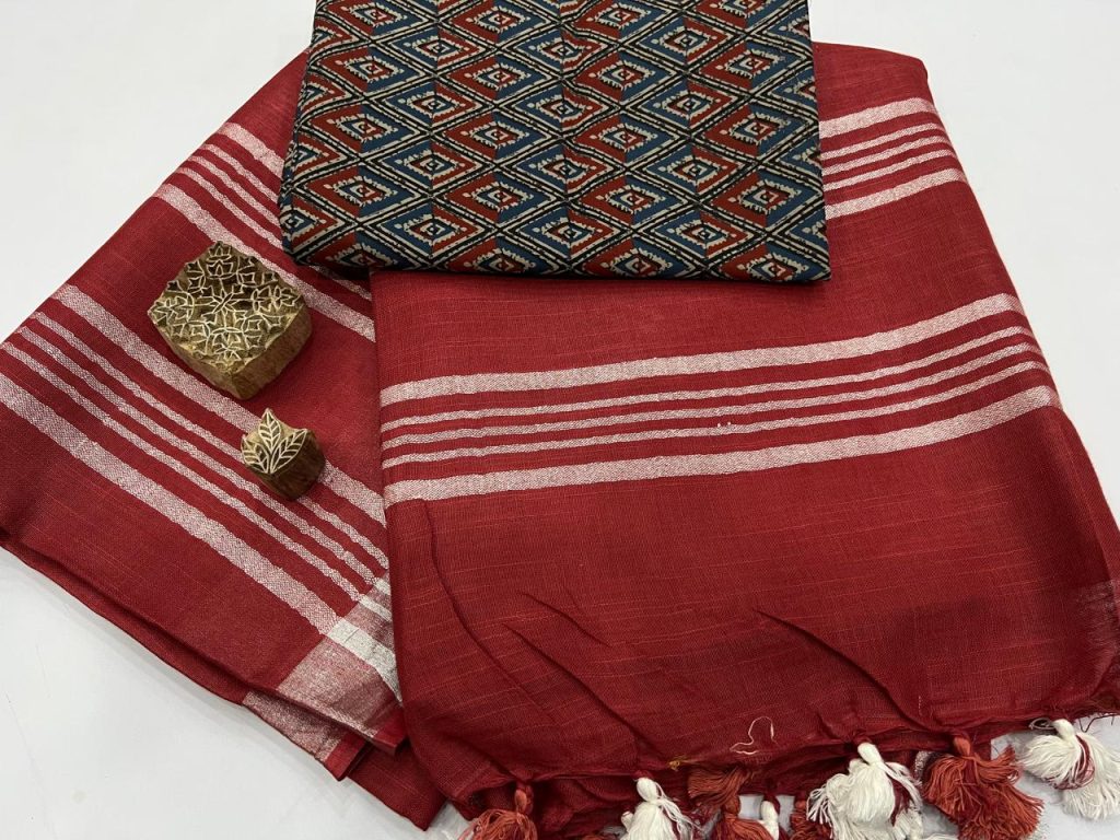 Falu Red Plain linen saree with silver border