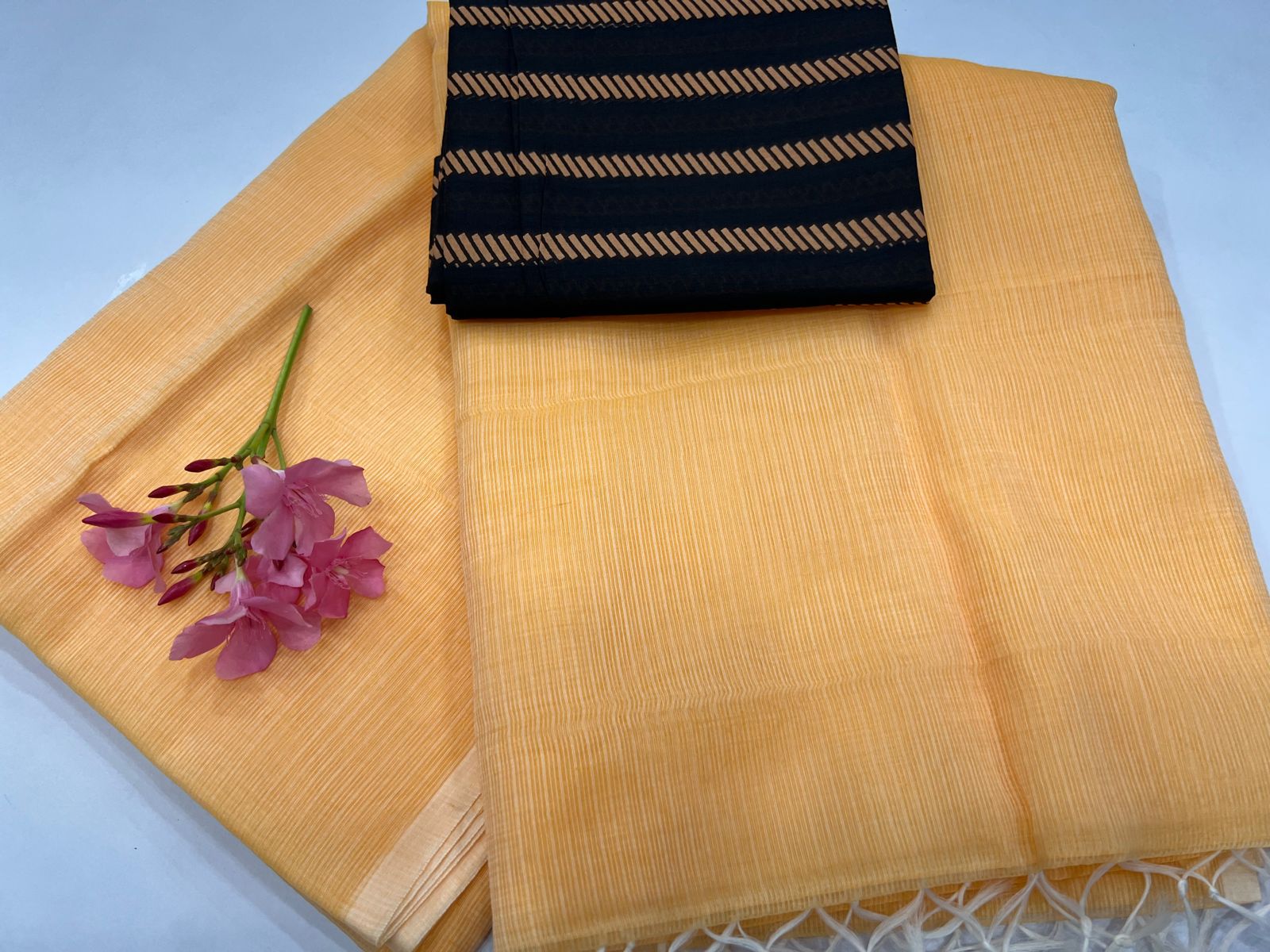 Amber color plain sarees latest in kota doria