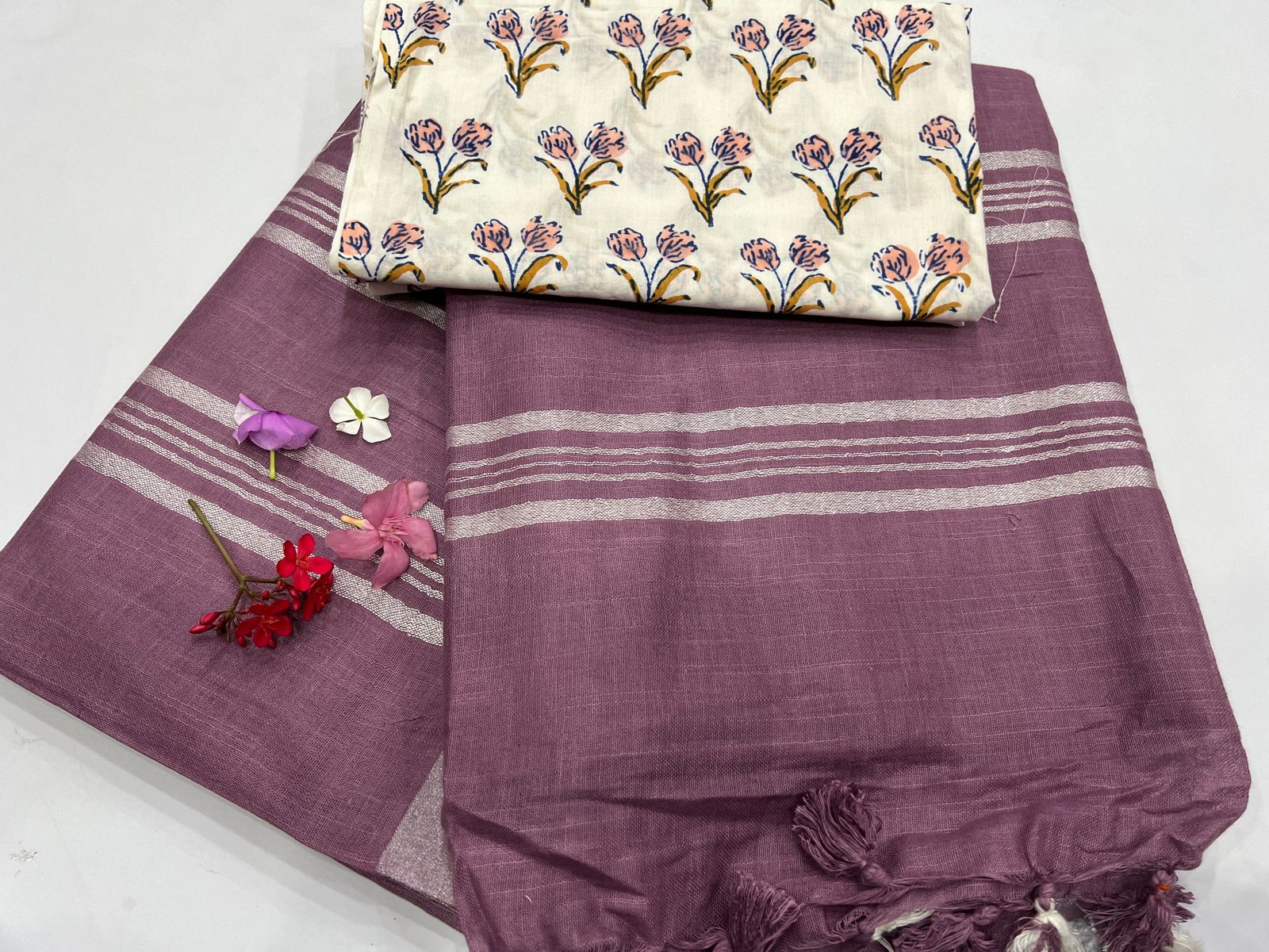 Boysenberry plain linen silver zari saree with white printed cotton blouse