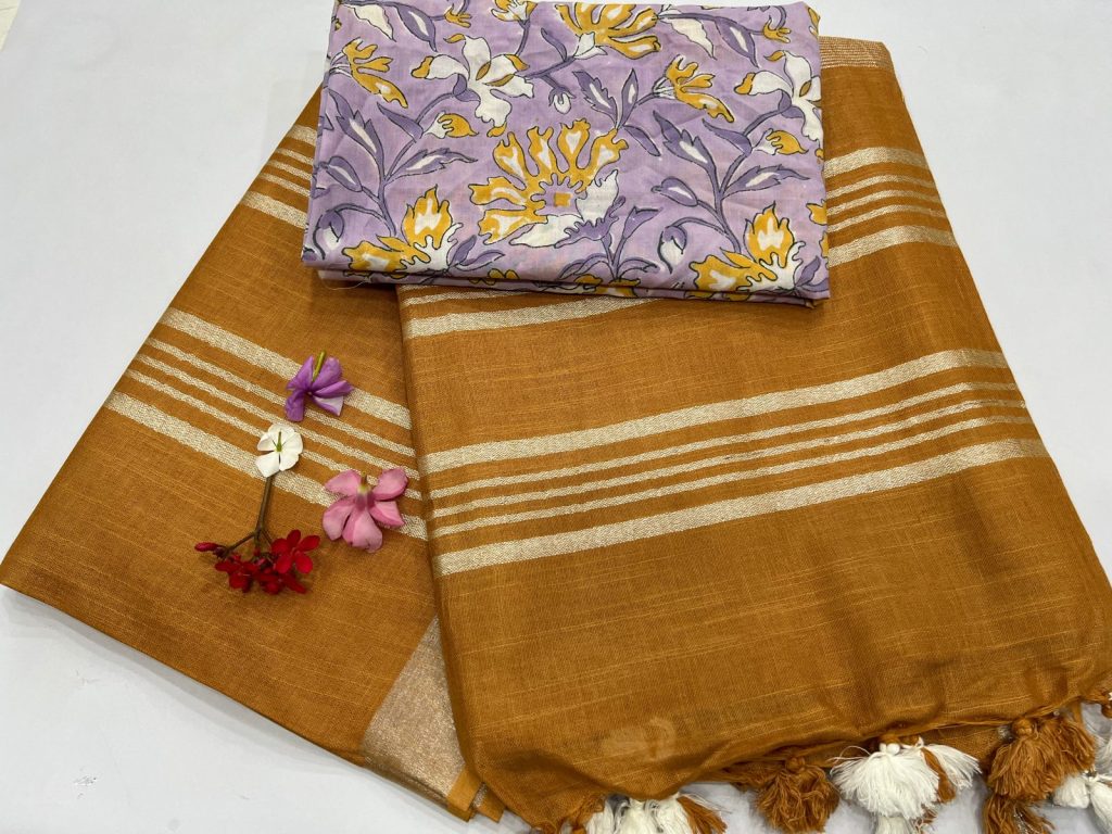 Bronze linen saree with silver border with printed cotton blouse