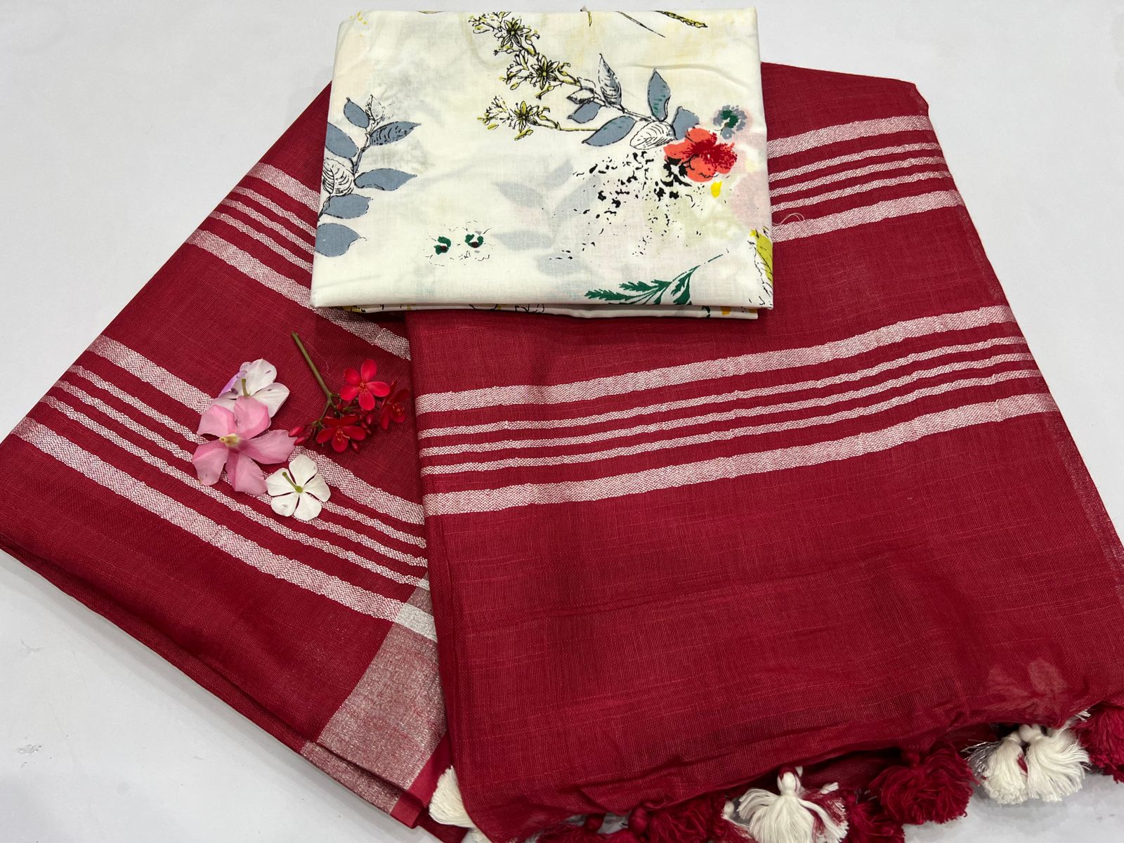 Vivid Burgundy plain linen latest saree collection with white printed blouse
