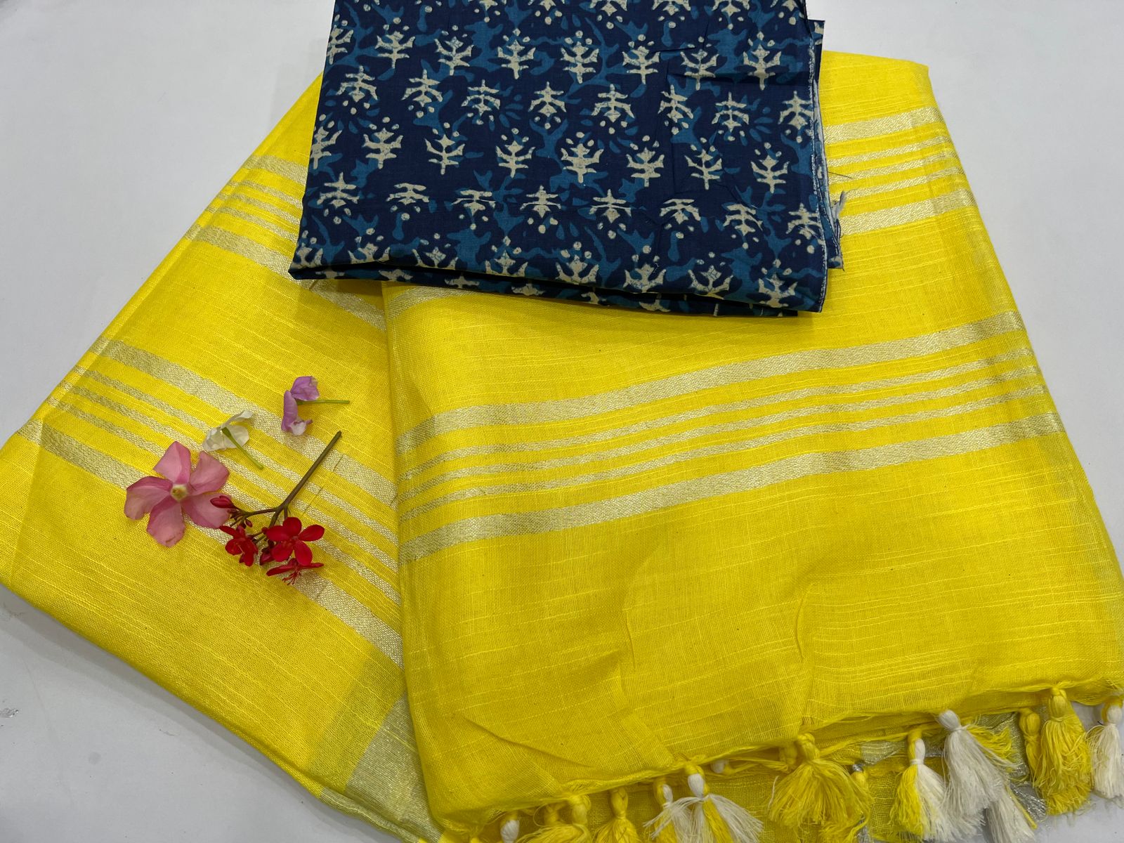 Yellow linen plain sarees latest with printed cotton blouse