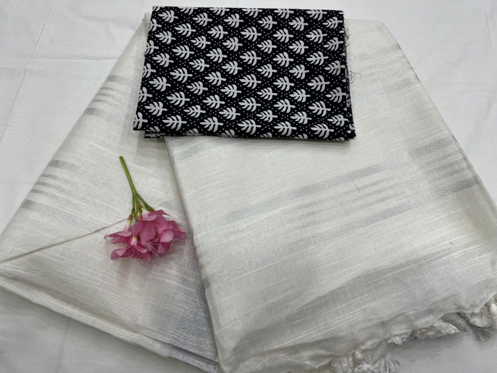 White Plain linen cotton saree price with black printed cotton blouse.