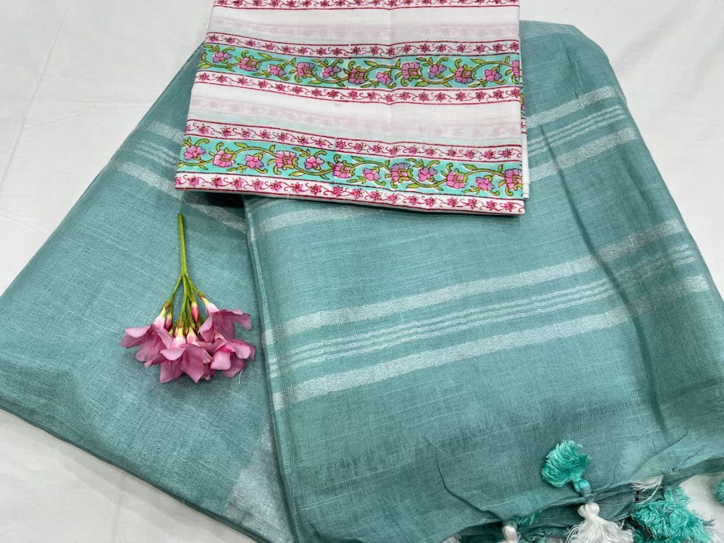 Icy Morn Plain Linen sarees with zari and white printed blouse