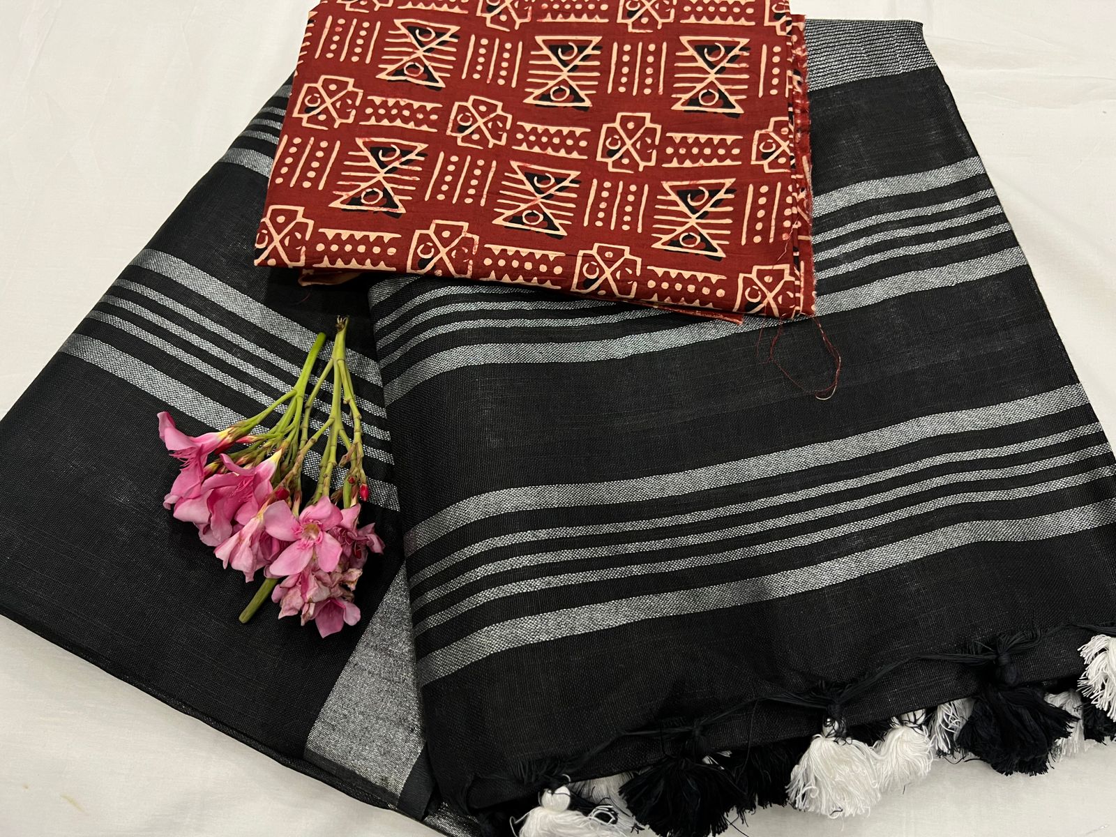 Black plain linen sarees with red blouse