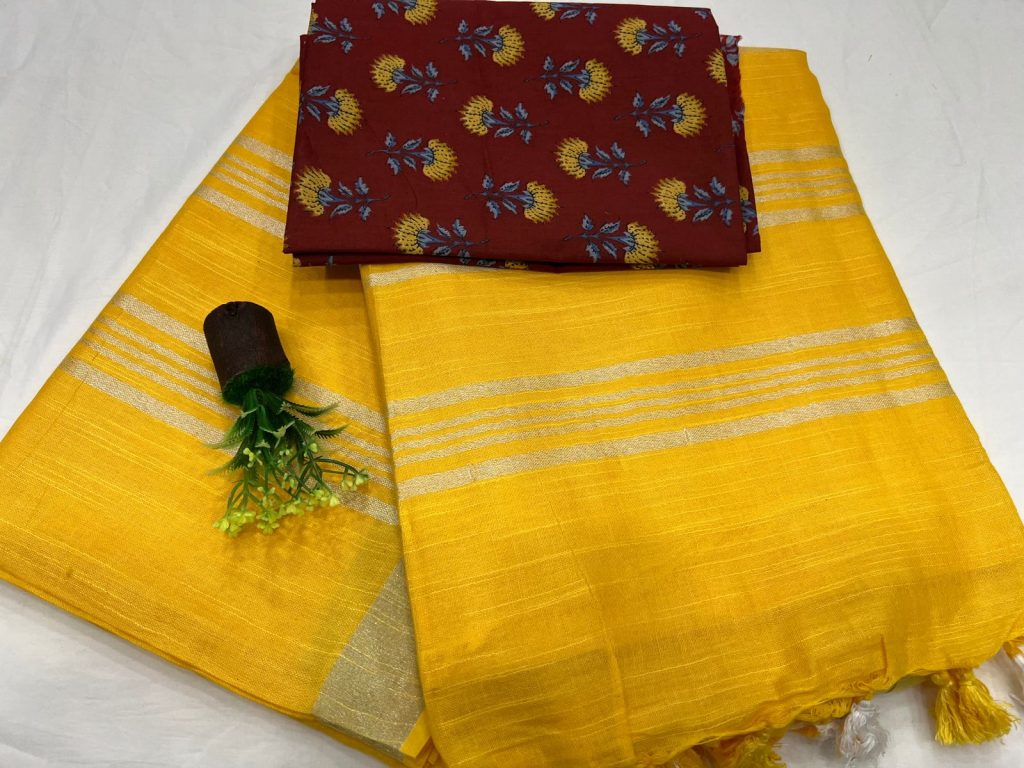 Carrot Orange plain linen sarees online with printed cotton blouse
