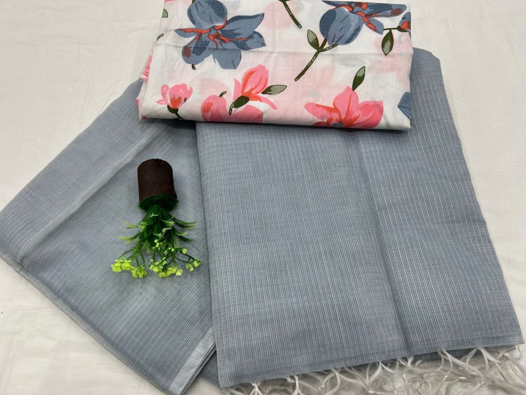 Gray plain kota doria saree with white printed cotton blouse