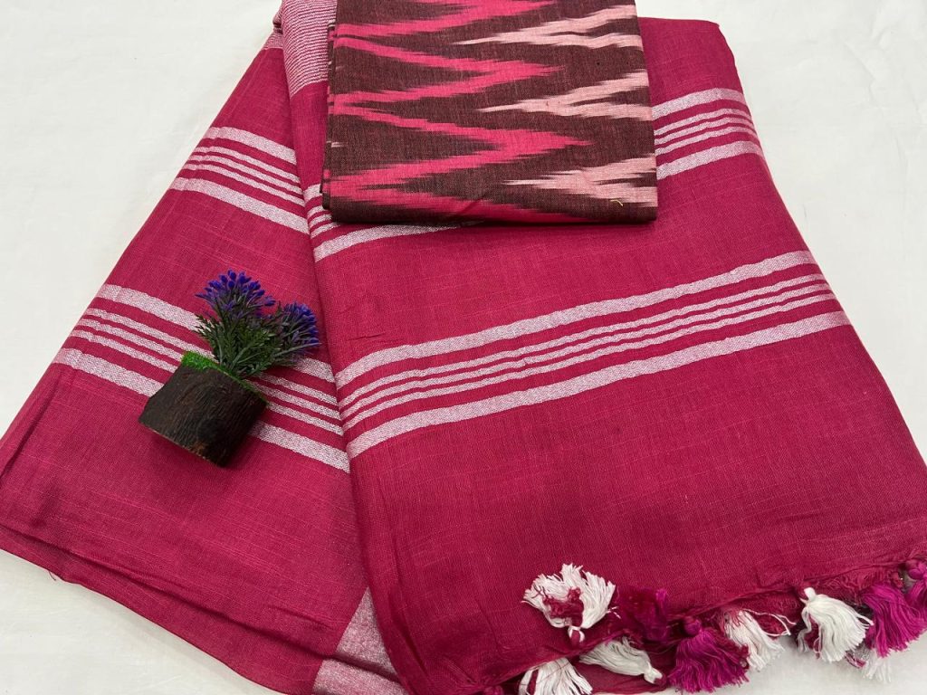 Cerise plain linen saree with zari border with ikkat print blouse