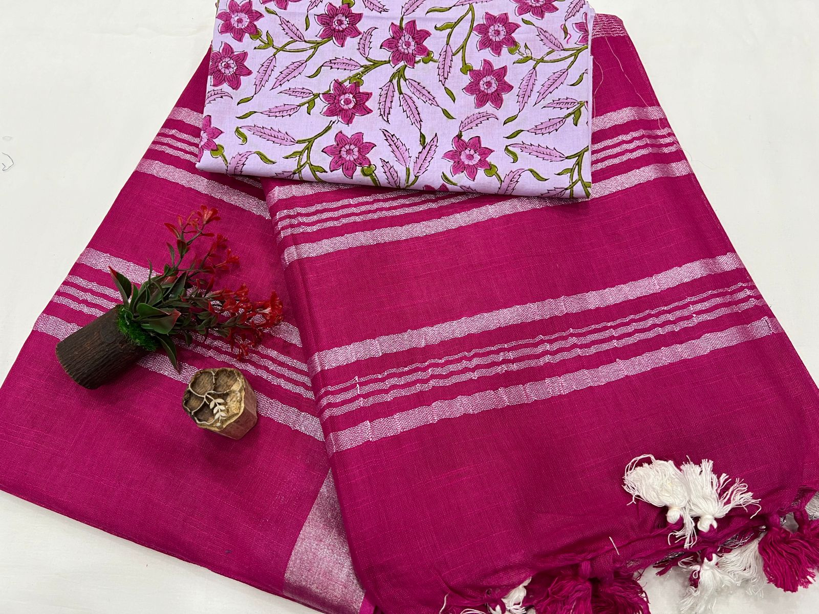 Cerise pink plain Linen sarees with zari and printed cotton blouse