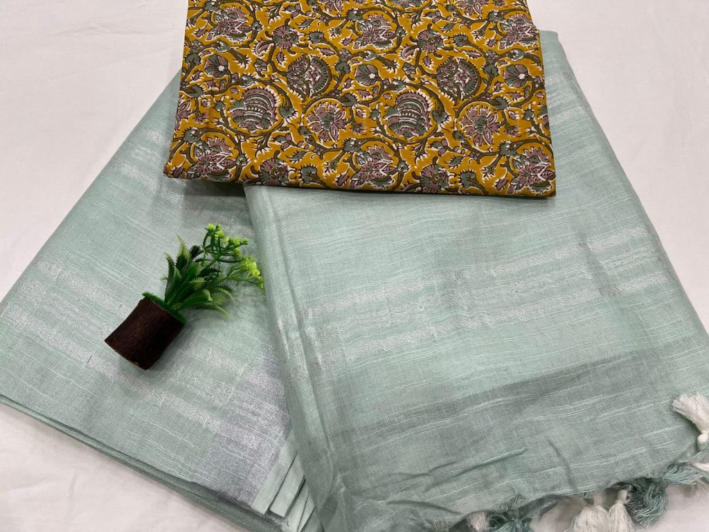 Celadon green plain linen saree with cotton blouse