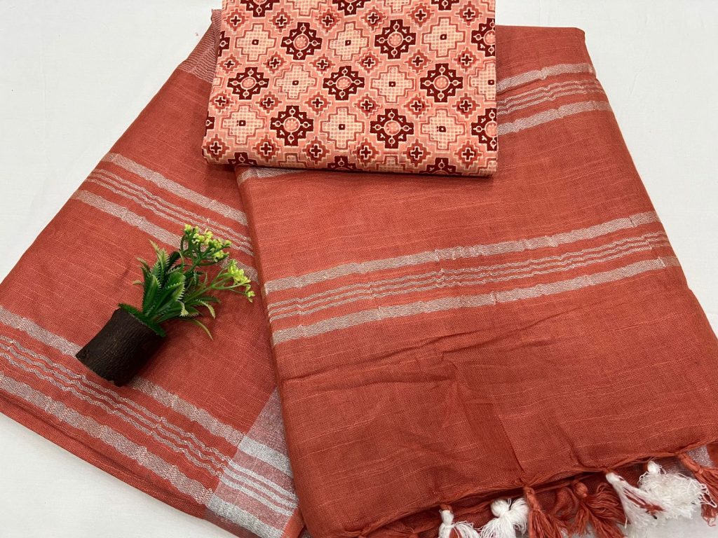 Burnt orange plain linen saree with cotton blouse