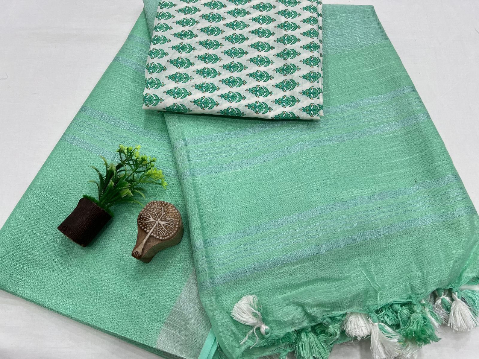 Mint Green Linen Saree with Botanical Print Blouse – Refreshing Style