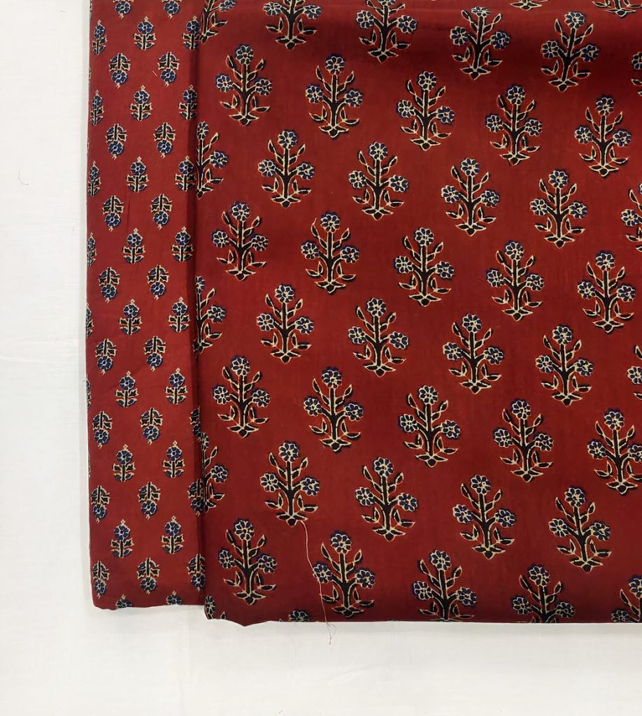 Ruby Red with Blue Floral Symmetry Cotton Fabric