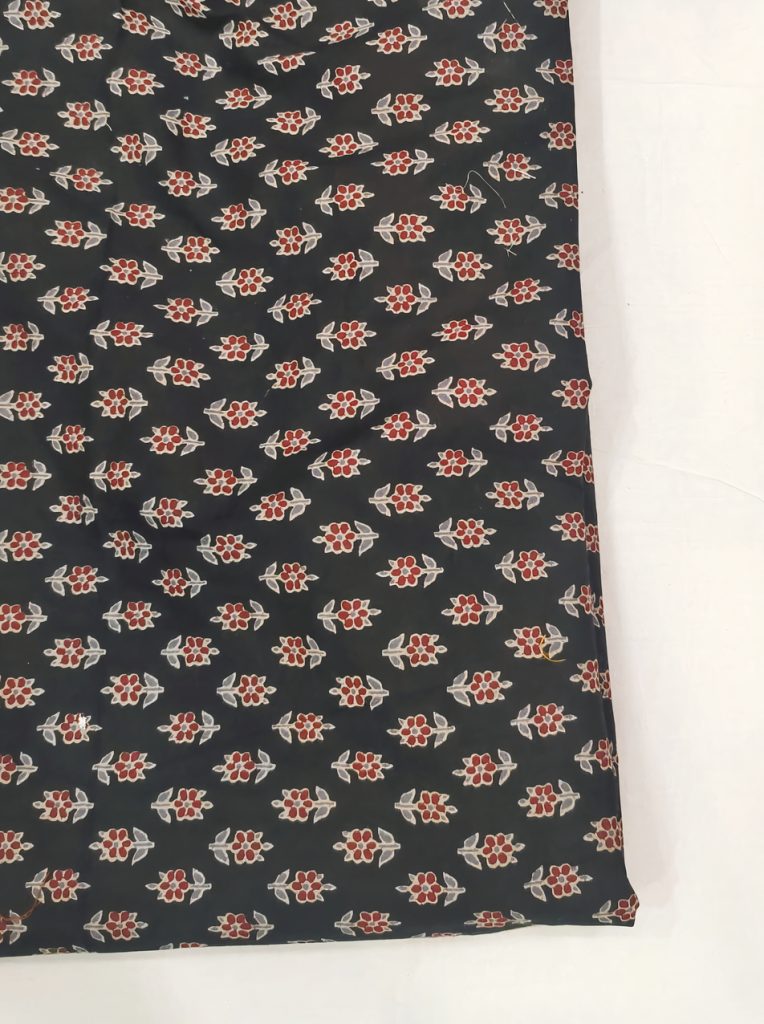 Sophisticated Black Cotton Fabric with Vibrant Floral Print