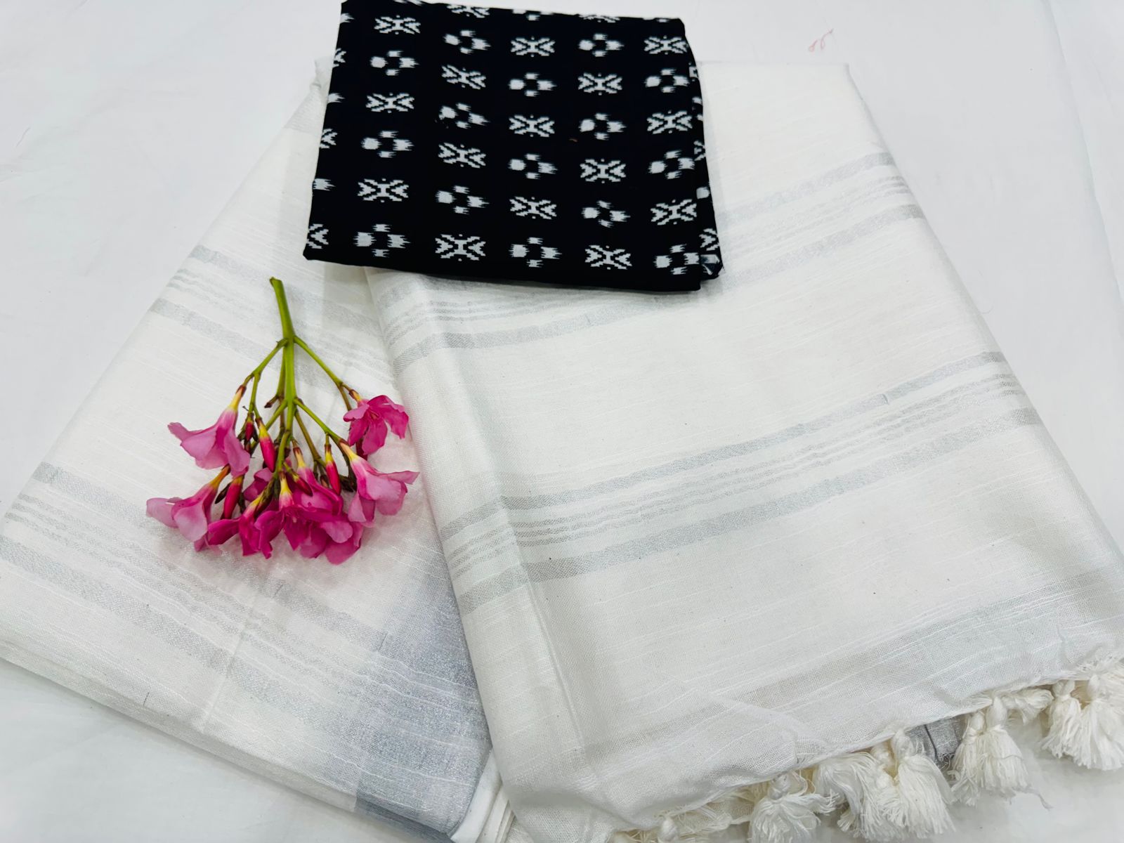 White linen saree with black cotton blouse