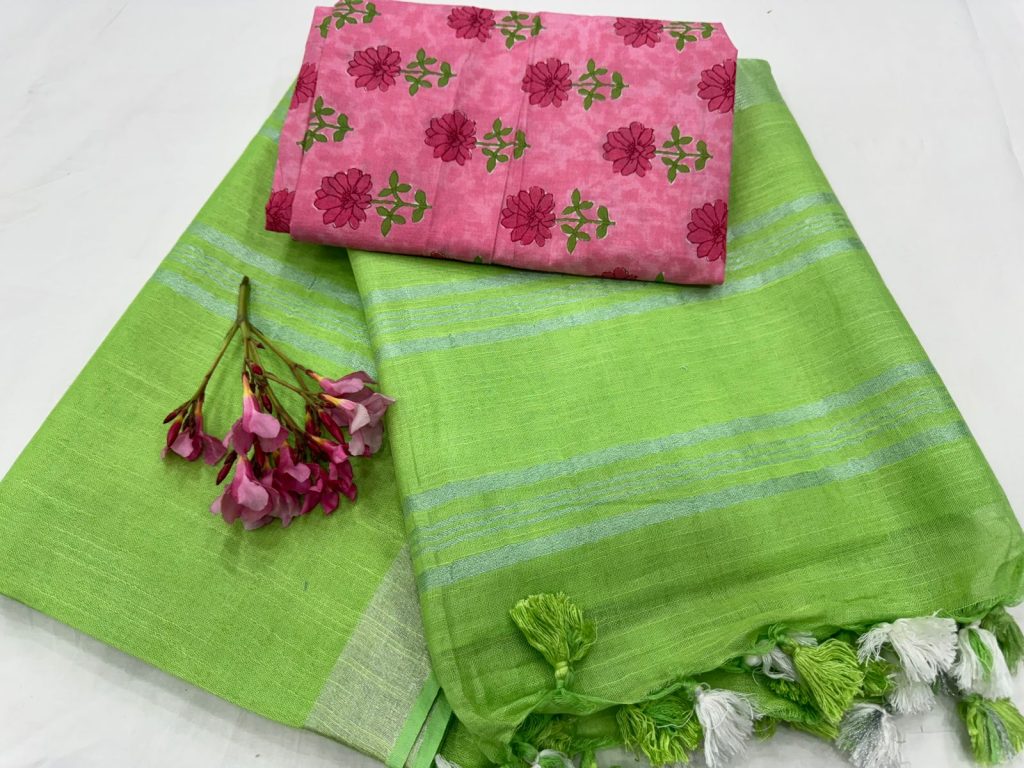 Bright green plain linen saree with floral print cotton blouse