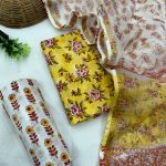 Sun-kissed Yellow Botanical Print Cotton Suit with Delicate Kota Doria Dupatta