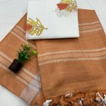 Classic Rust Linen Saree with Elegant White Embroidery