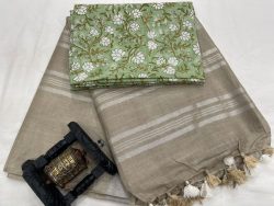 Grey linen saree with brick red printed blouse
