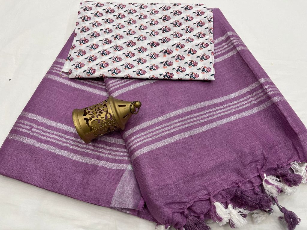 Purple color linen saree with pink printed blouse