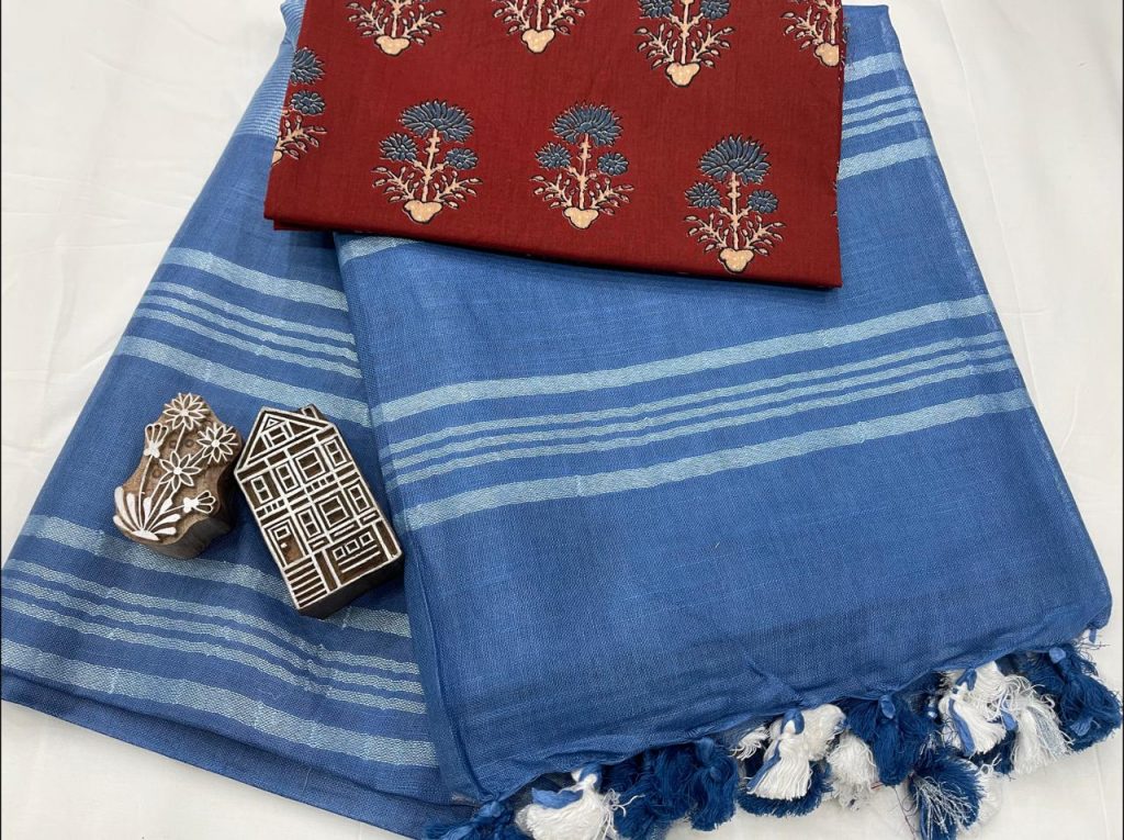 Plain blue Linen saree with printed blouse