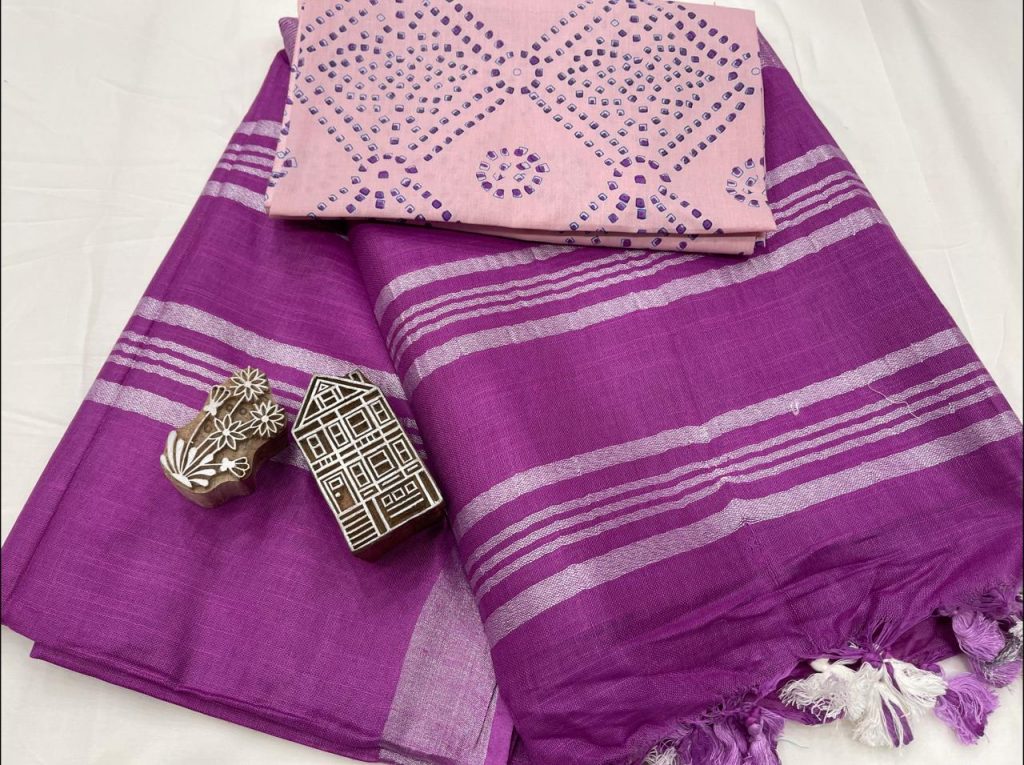 Bright purple plain linen saree with printed blouse