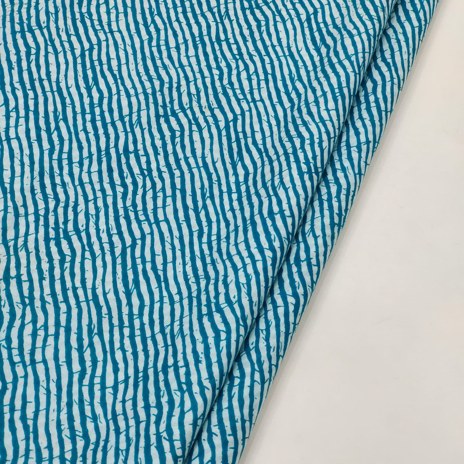 Blue green lehariya print cotton running material