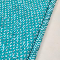 Printed cotton running material in Turquoise color