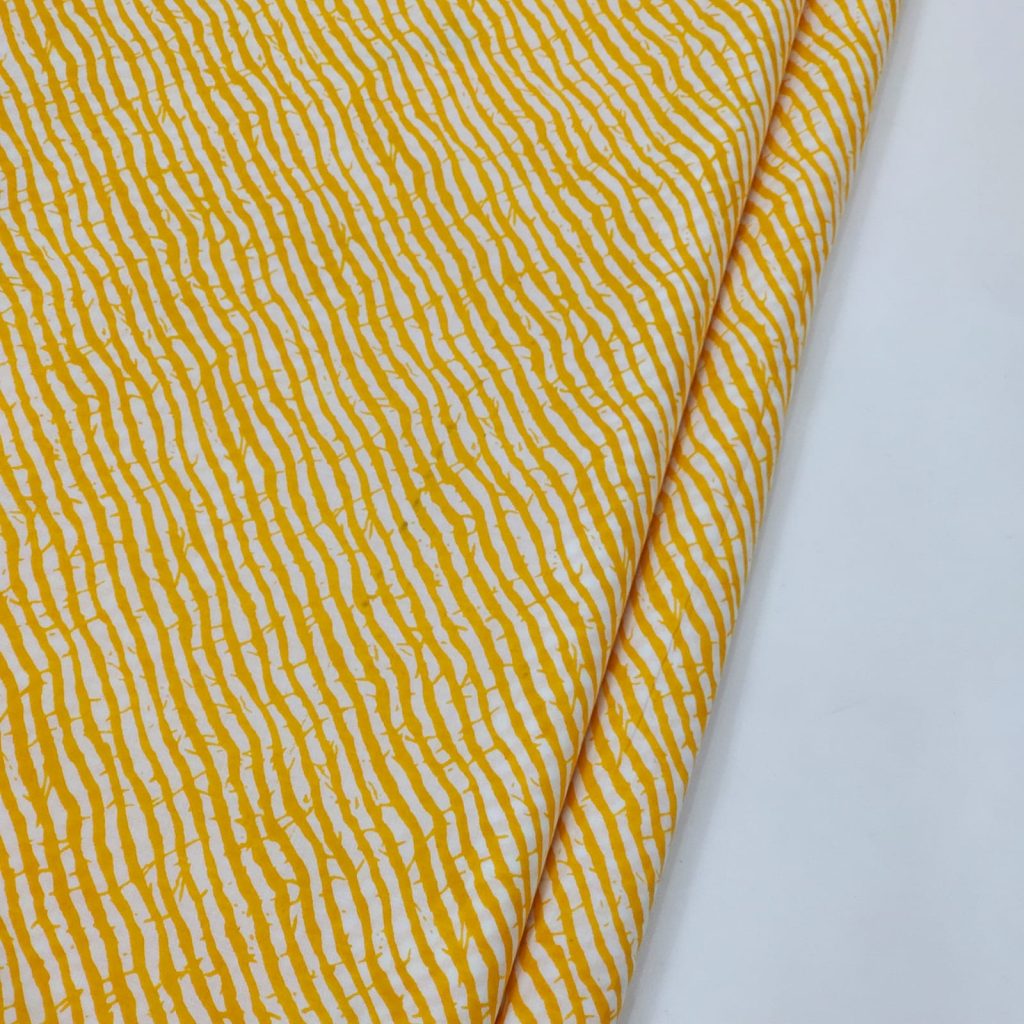 Yellow lehariya print cotton running material